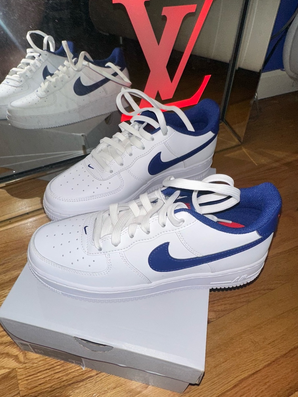 Nike White Leather Sneakers with Blue Swoosh